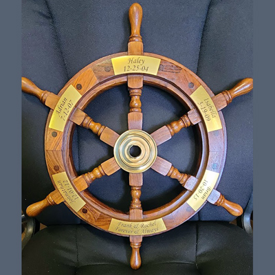 Custom engraved wooden boat wheel, Engraver's Den