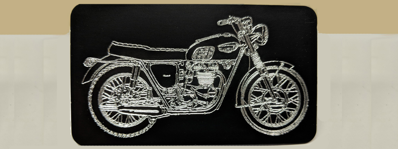 Custom laser & rotary engraving services for cars, trucks, SUVs; engraved automotive & motorcycle related products, VIN tags, Engraver's Den, MA, RI